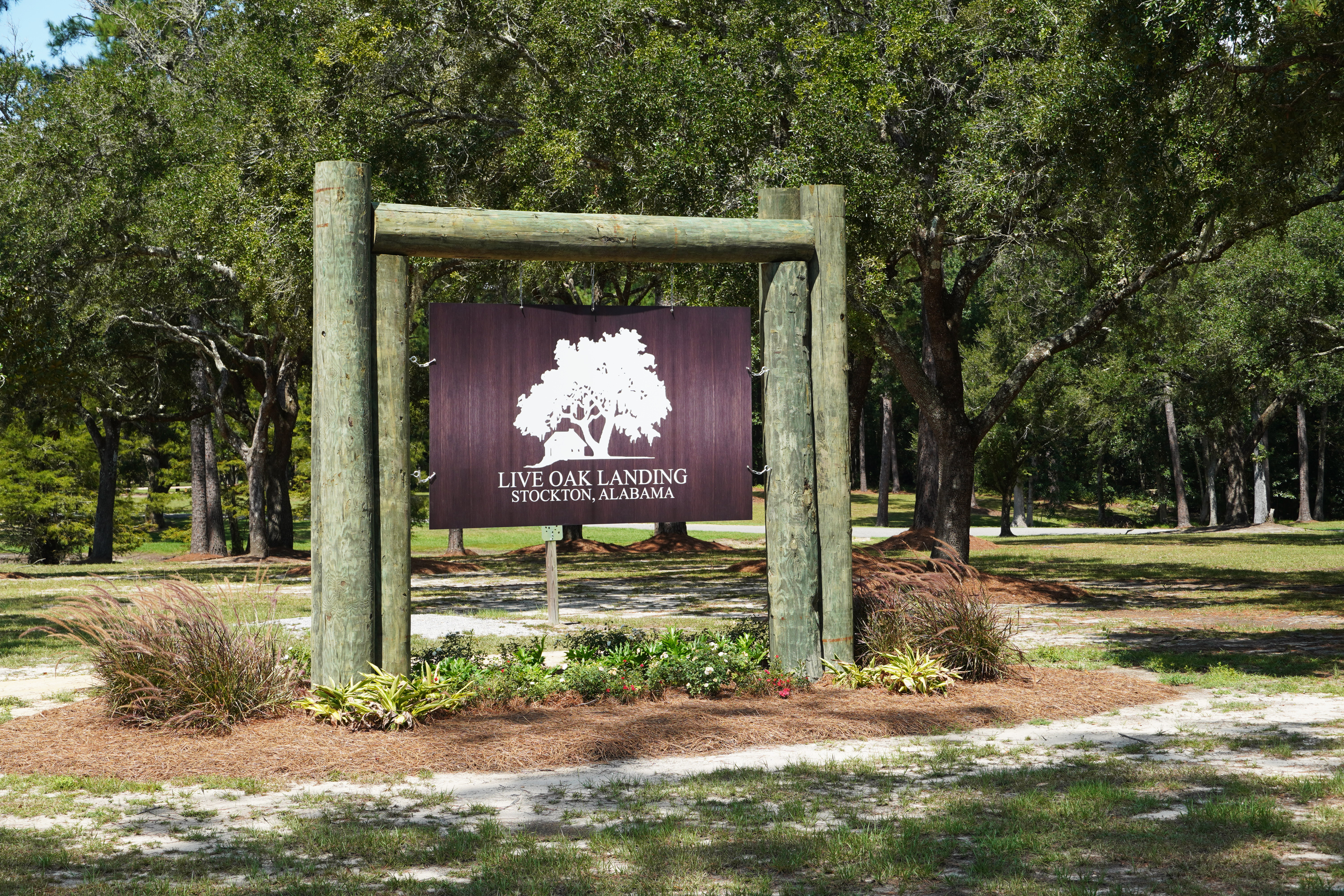 sign at entrance of live oak landing